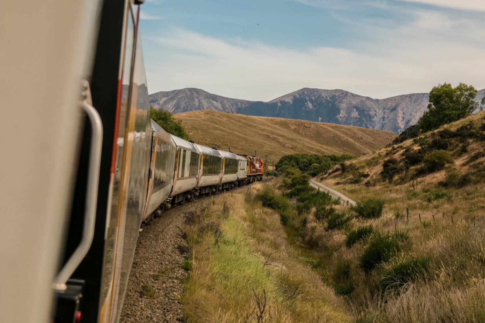 Train through green hills
